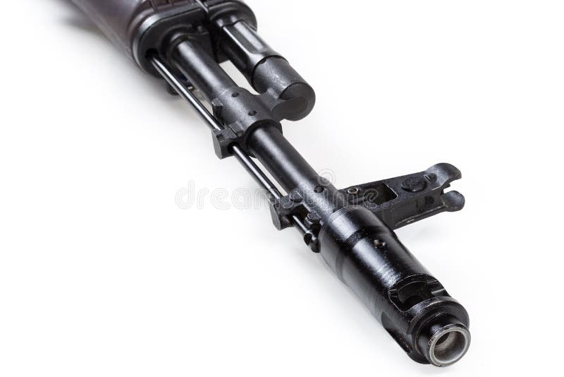 Part of former soviet assault rifle AK-74 with barrel, gas block, iron sights and flame arrester, view from barrel muzzle side on a white background. Flame arrester stock images, royalty-free photos and pictures