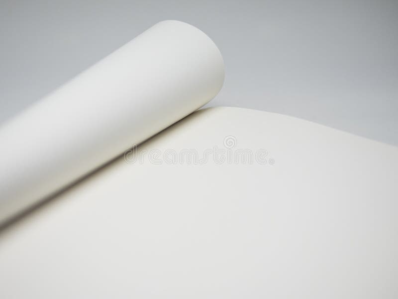 Blank open booklet or magazine close up. Fragment of blank open book or notebook on white background with soft shadows close up, wave stock photography Blank open booklet or magazine close up. Fragment of blank open book or notebook on white background with soft shadows close up, wave stock photography