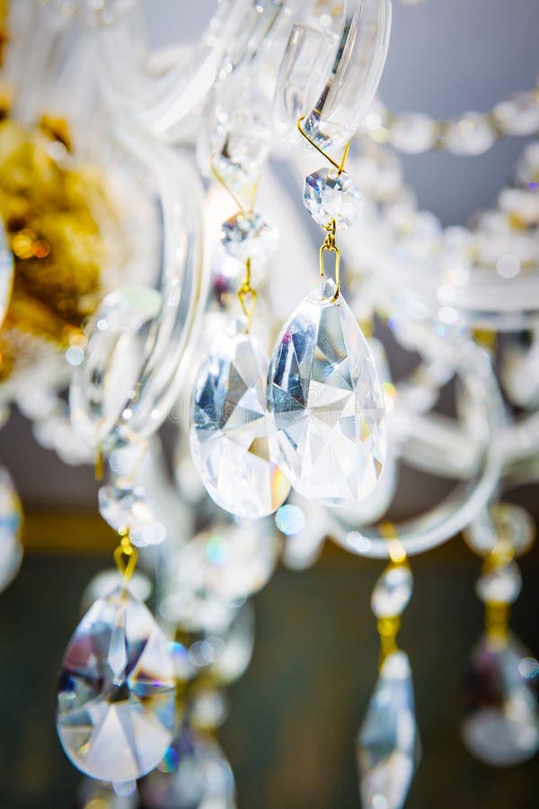 A Fragment of a Crystal Chandelier Stock Photo - Image of gold ...