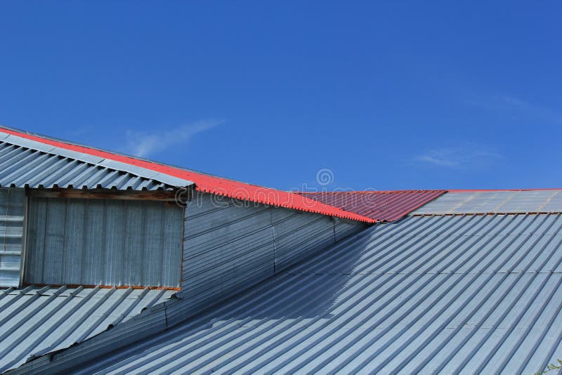 Fragment of a metal roof royalty free stock image