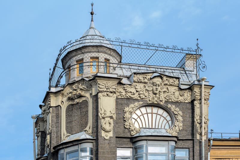 Fragment of the modern style building facade with elements of an architectural decor in St. Petersburg, Russia royalty free stock image