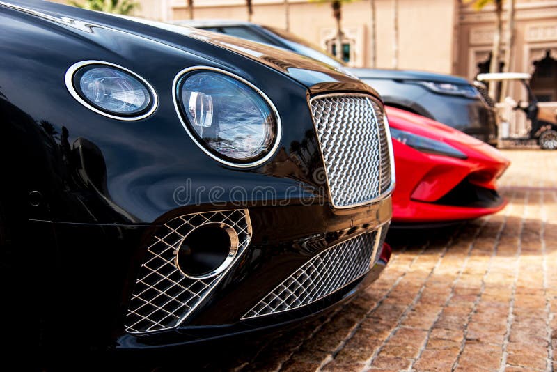 Fragment with original headlights of a modern expensive car royalty free stock photo