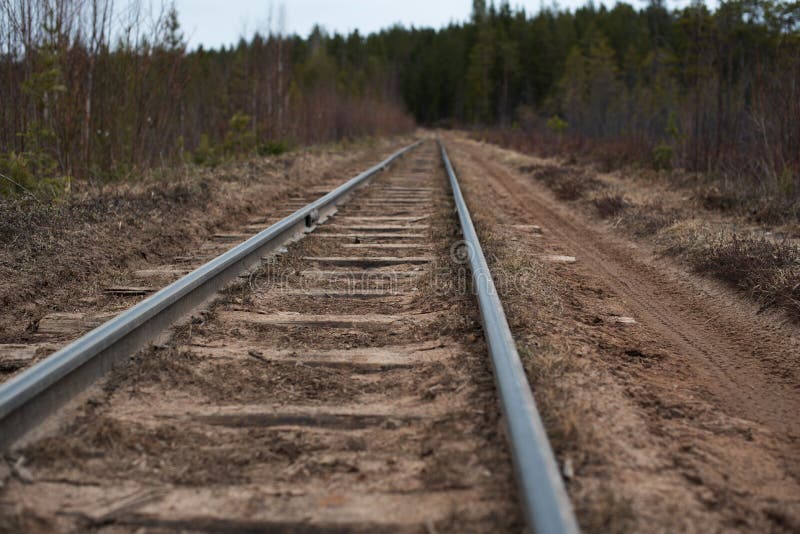 Railway in the sand. fragment of the railway. Sand fragment stock images, royalty-free photos and pictures