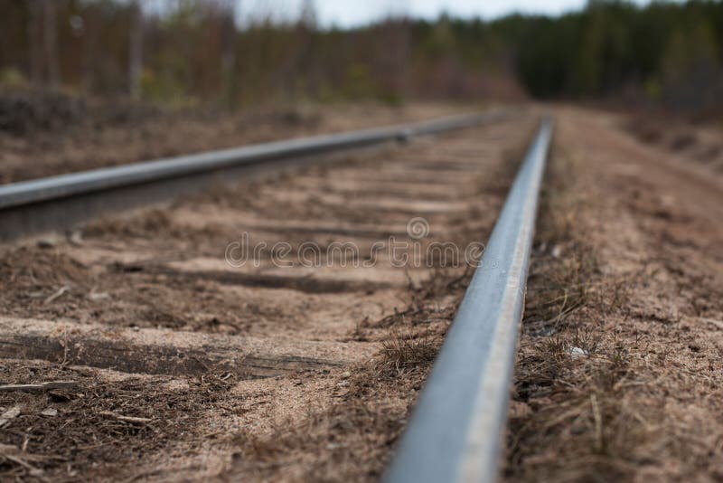 Railway in the sand. fragment of the railway. Sand fragment stock images, royalty-free photos and pictures