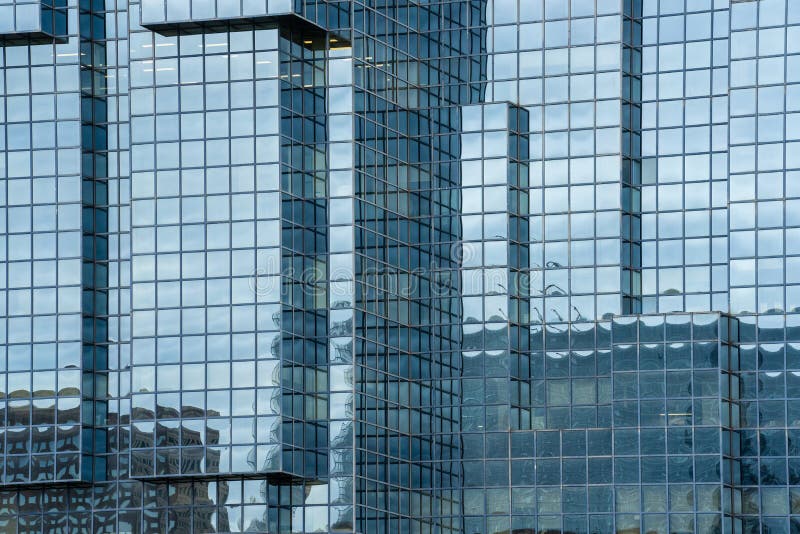 A fragment of the steel and glass modern building structure royalty free stock images