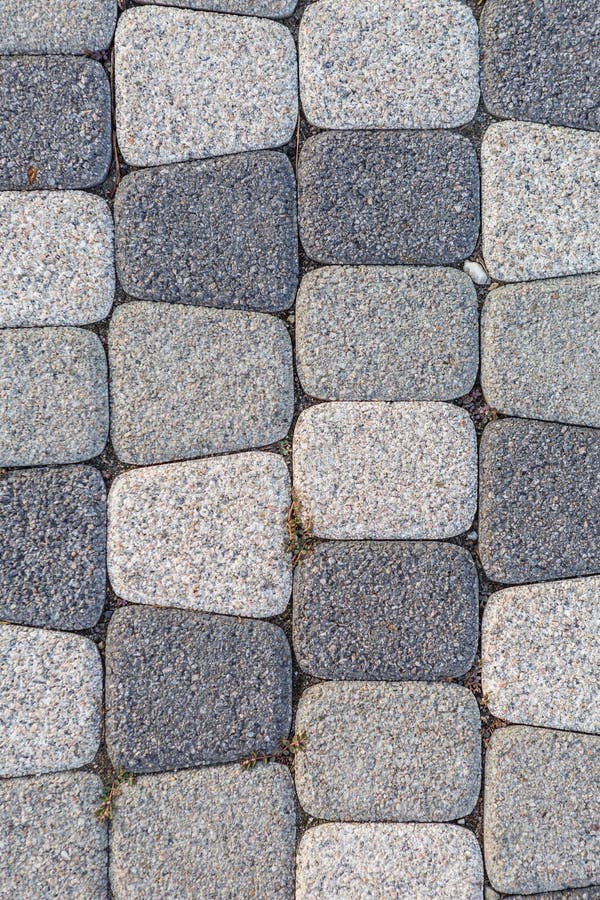 Fragment of stone pavement cobble-stones texture as a background stock photography Fragment of stone pavement cobble-stones texture as a background stock photography