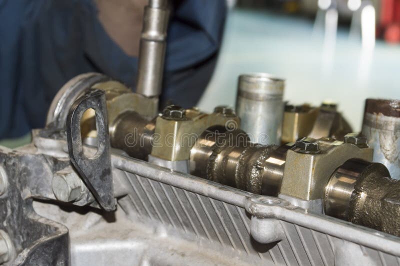A Fragment of the Timing Camshaft Installed in the Head of the Engine
