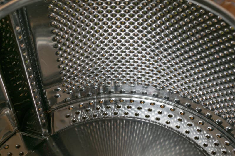 Fragment of a washing machine drum stock photo
