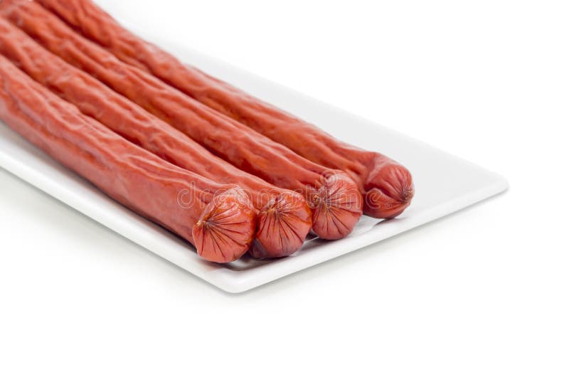 Smoked Vienna Sausages on White Rectangular Dish Closeup Stock Image