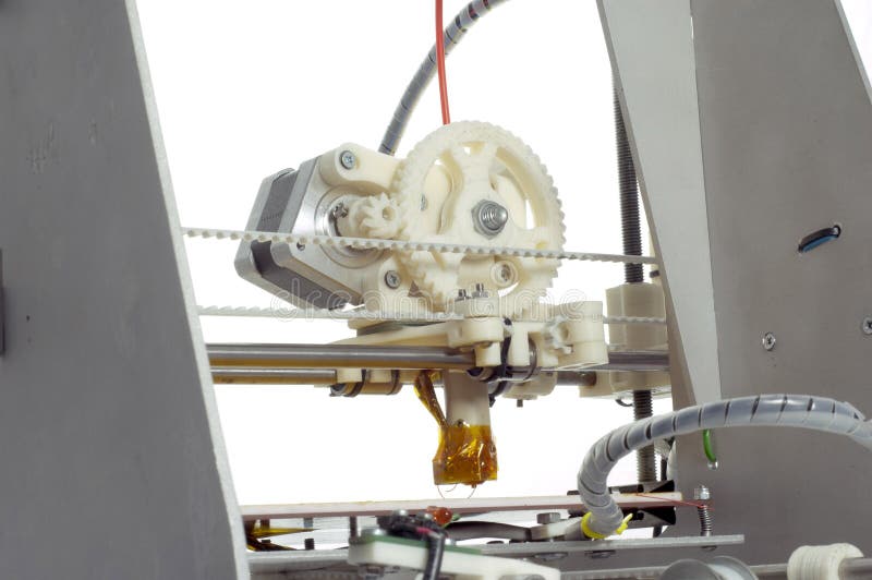 Photo of the small machine detail. 3D printer. Photo of the small machine detail. 3D printer