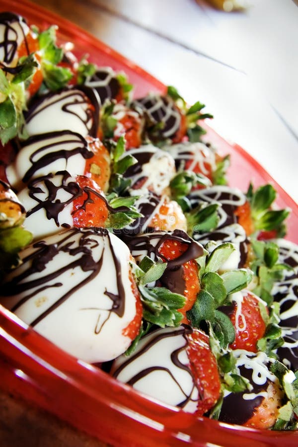 Decadent dipped strawberries drizzled with dark chocolate. Decadent dipped strawberries drizzled with dark chocolate