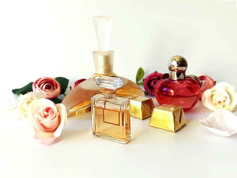 perfume with red flower on bottle
