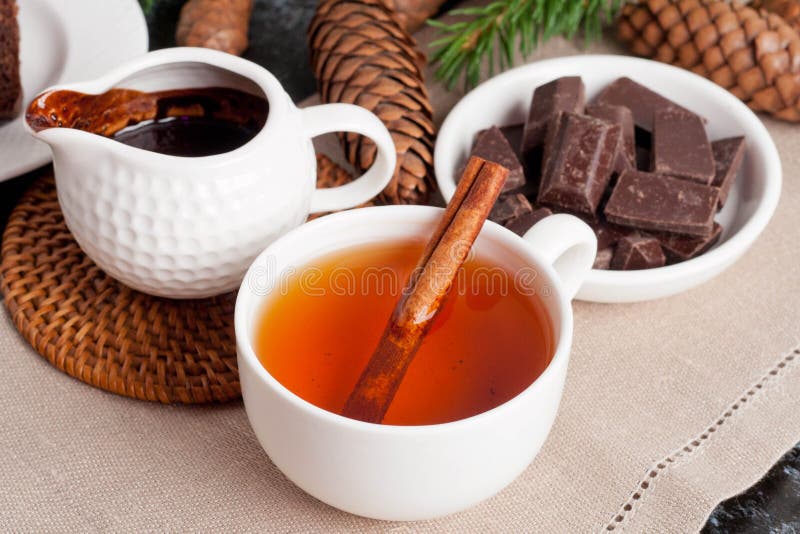 Fragrant Black Tea with Cinnamon and Chocolate, Close Up Stock Photo