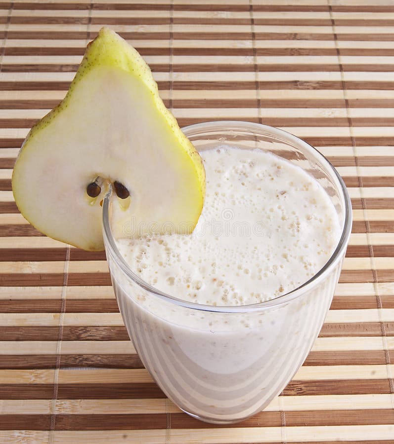 Fragrant fresh pear smoothy royalty free stock photography