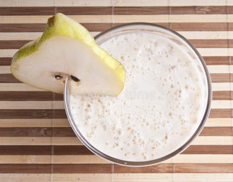 Fragrant fresh pear smoothy royalty free stock photography