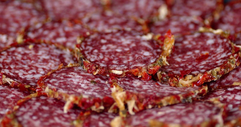 Fragrant slices of salami slowly rotate. stock video