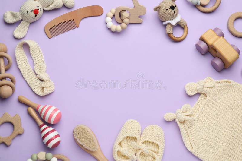 Frame of Baby Clothes and Accessories on Lilac Background, Flat Lay