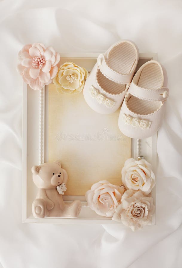 Frame background and baby shoes royalty free stock image