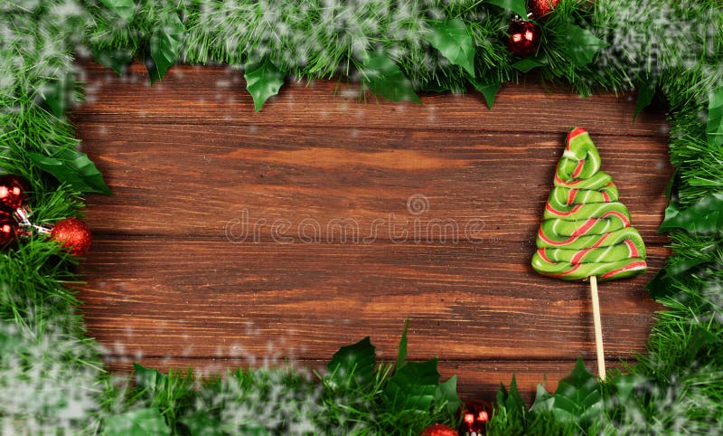 frame of Christmas tree branches with toys on a wooden background royalty free stock photography frame of Christmas tree branches with toys on a wooden background royalty free stock photography