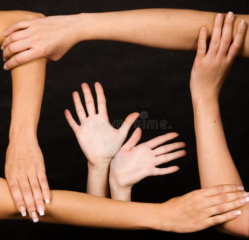 Hands forming a frame over dark background. Hands forming a frame over dark background