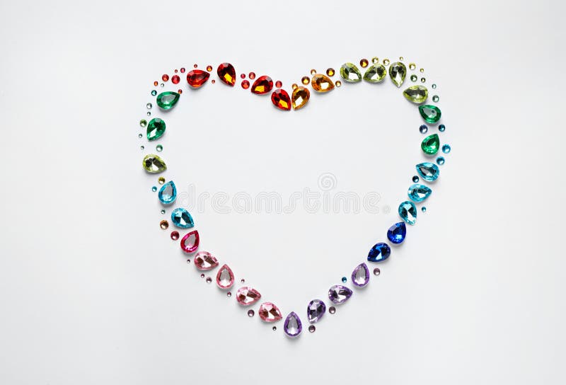 Frame made of different beautiful gemstones on white background. Space for text royalty free stock images