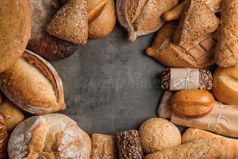 Frame made with fresh bread on grey background stock image