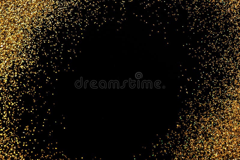 Frame made of gold glitter on black background