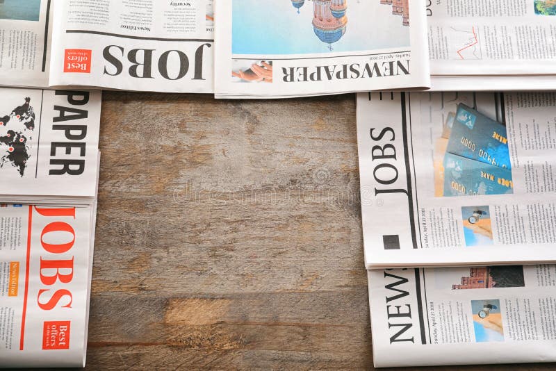 Frame Made with Newspapers on Wooden Background Stock Image - Image of