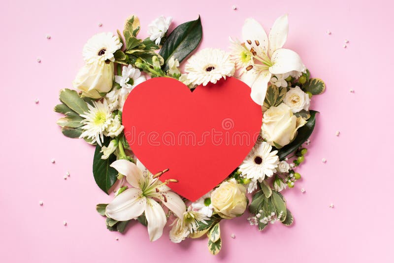 Frame Of White Flowers, Pink Paper Heart Over Pink Background. Valentines Day, Woman Day Concept. Spring Or Summer Banner With