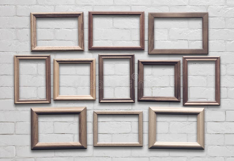Frames on white wall stock image. Image of wooden, aged 233127763