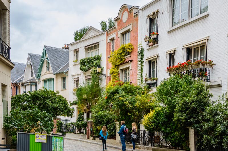 France, Paris, October 6, 2014: Paris residential buildings. Old Paris architecture, beautiful facade, typical french houses on