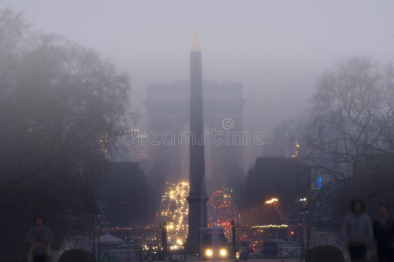 France - Paris - Place de la Concorde - View with the Egyptian Obelisque and the Arc de Triomphe in background at dawn