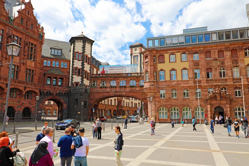 FRANKFURT, GERMANY - JUNE 13, 2019: Paulsplatz with beautiful architecture and Ratskeller with tourists in Frankfurt, Germany.