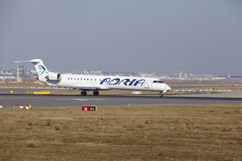 Frankfurt International Airport – Adria Airways Canadair 900 takes off royalty free stock photo Frankfurt International Airport – Adria Airways Canadair 900 takes off royalty free stock photo