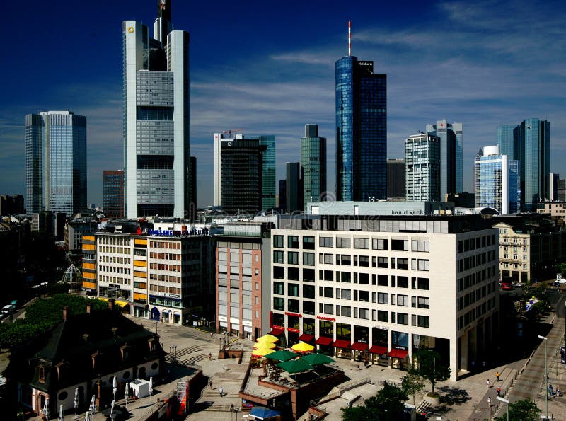 Hosting the European Central Bank (the highrise building to the very left) Frankfurt, Germany, is one of the main banking centers of Europe. The city with only 600,000 inhabitants (approximately 28 percent born outside of Germany) is the hub of the greater Rhein Main metropolitan area with more than 4 million people. The dominant highrise building (second from the left, Commerzbank) is the highest building in Europe. Hosting the European Central Bank (the highrise building to the very left) Frankfurt, Germany, is one of the main banking centers of Europe. The city with only 600,000 inhabitants (approximately 28 percent born outside of Germany) is the hub of the greater Rhein Main metropolitan area with more than 4 million people. The dominant highrise building (second from the left, Commerzbank) is the highest building in Europe.