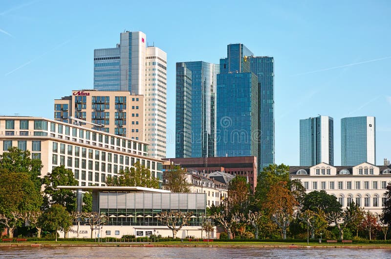 Frankfurt am Main, Germany - June 3, 2013: Financial district of Frankfurt am Main. View of twin towers of Deutsche Bank (headquarter), the tower of German Railways (Deutsche Bahn), and the Skyper building complex. Frankfurt am Main, Germany - June 3, 2013: Financial district of Frankfurt am Main. View of twin towers of Deutsche Bank (headquarter), the tower of German Railways (Deutsche Bahn), and the Skyper building complex