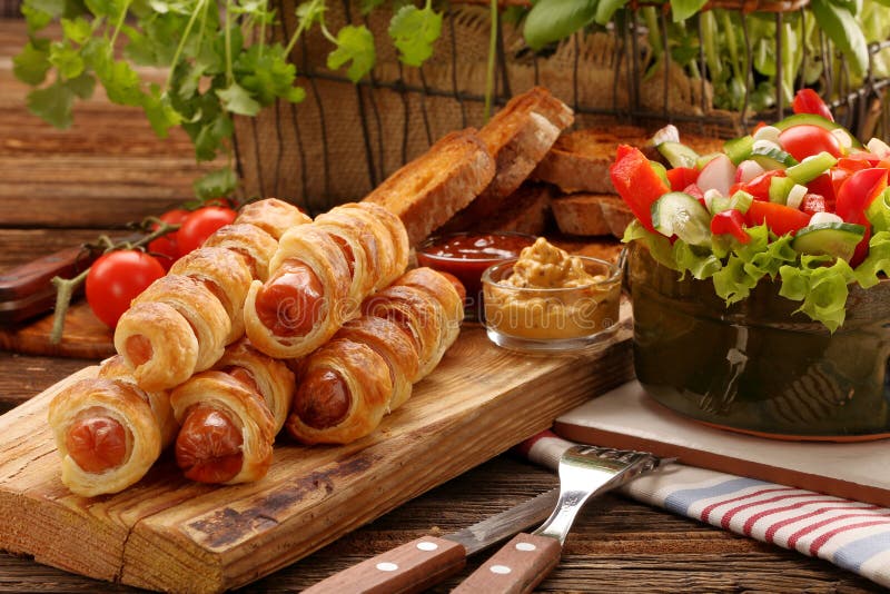 Frankfurters rolled sausages baked in puff pastry