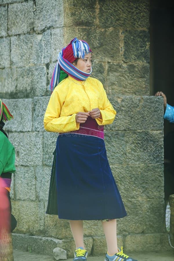 Ethnic minority woman, at old Van market, Ha Giang province, Vietnam. Ha Giang is one of the six poorest provinces of Vietnam. Ha Giang is a famous tourist destination in Vietnam. Photo taken on: 03 May 2011. Ethnic minority woman, at old Van market, Ha Giang province, Vietnam. Ha Giang is one of the six poorest provinces of Vietnam. Ha Giang is a famous tourist destination in Vietnam. Photo taken on: 03 May 2011