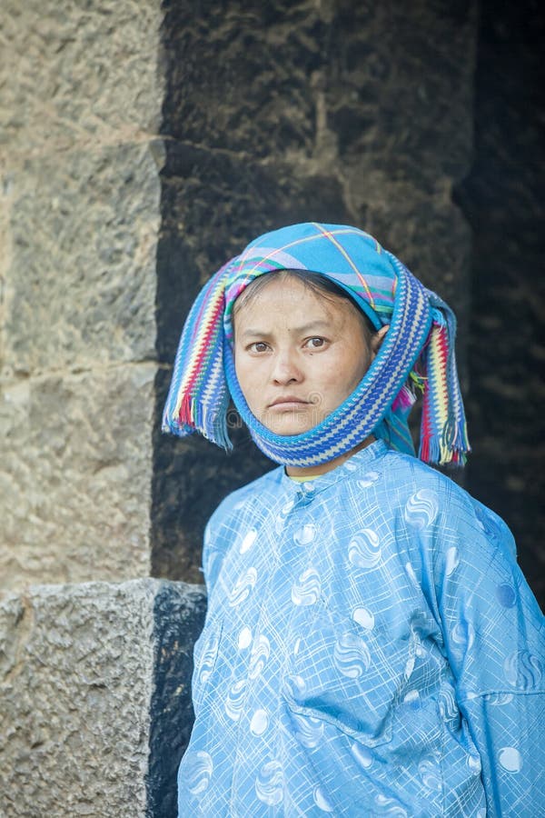 Ethnic minority woman, at old Van market, Ha Giang province, Vietnam. Ha Giang is one of the six poorest provinces of Vietnam. Ha Giang is a famous tourist destination in Vietnam. Photo taken on: 03 May 2011. Ethnic minority woman, at old Van market, Ha Giang province, Vietnam. Ha Giang is one of the six poorest provinces of Vietnam. Ha Giang is a famous tourist destination in Vietnam. Photo taken on: 03 May 2011