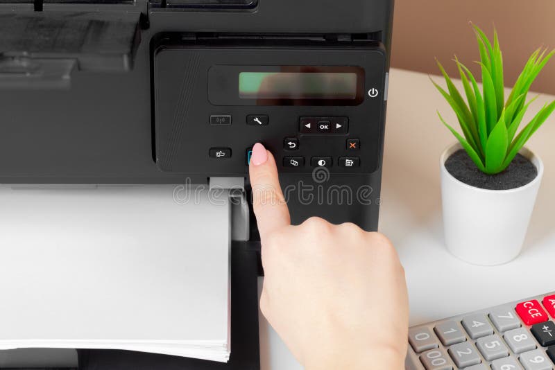 Woman using the printer to scanning and printing document. creative photo. Woman using the printer to scanning and printing document. creative photo.