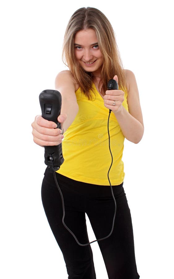 Frau spielt ein kabelloses Videospiel stockfotografie