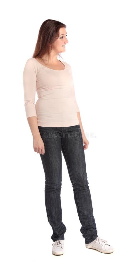 Full length shot of a young woman looking to the side. All on white background. Full length shot of a young woman looking to the side. All on white background.