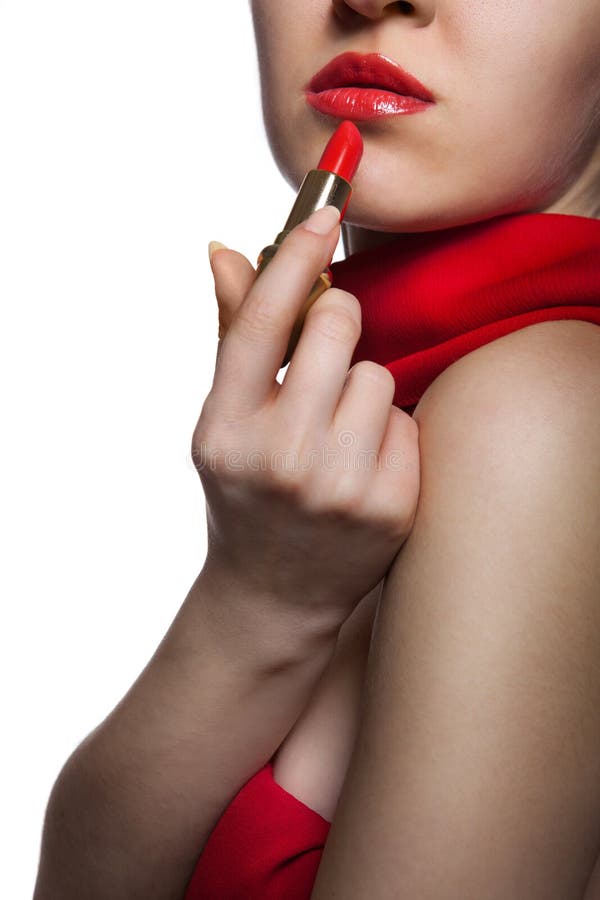 Frau mit den roten Lippen und Lippenstift lizenzfreies stockfoto Frau mit den roten Lippen und Lippenstift lizenzfreies stockfoto