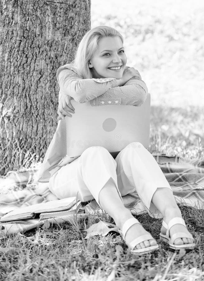 Woman with laptop work outdoors lean tree. Minute for relax. Education technology and internet concept. Work outdoors benefits. Girl work with laptop in park sit on grass. Natural environment office. Woman with laptop work outdoors lean tree. Minute for relax. Education technology and internet concept. Work outdoors benefits. Girl work with laptop in park sit on grass. Natural environment office.