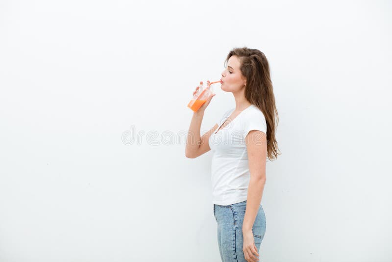 Frau mit Orangensaft lizenzfreie stockbilder Frau mit Orangensaft lizenzfreie stockbilder