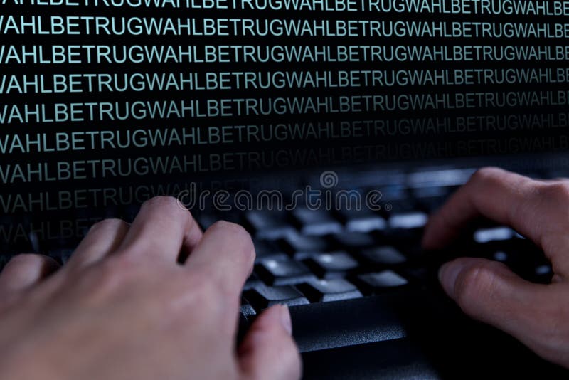 Fraude electoral del concepto, manos en un teclado, palabras alemanas fotografía de archivo Fraude electoral del concepto, manos en un teclado, palabras alemanas fotografía de archivo