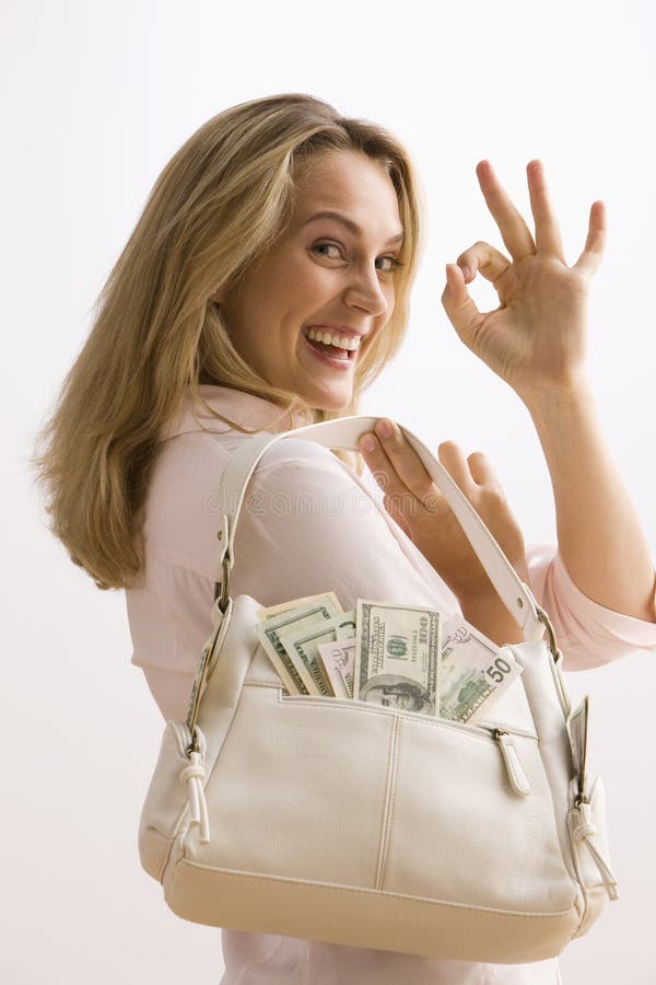 Frauen-Holding-Bargeld gefüllter Fonds stockfoto Frauen-Holding-Bargeld gefüllter Fonds stockfoto
