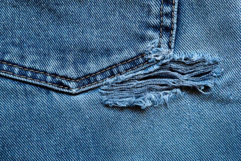 Frayed and torn old jeans stock image. Image of color - 4491903