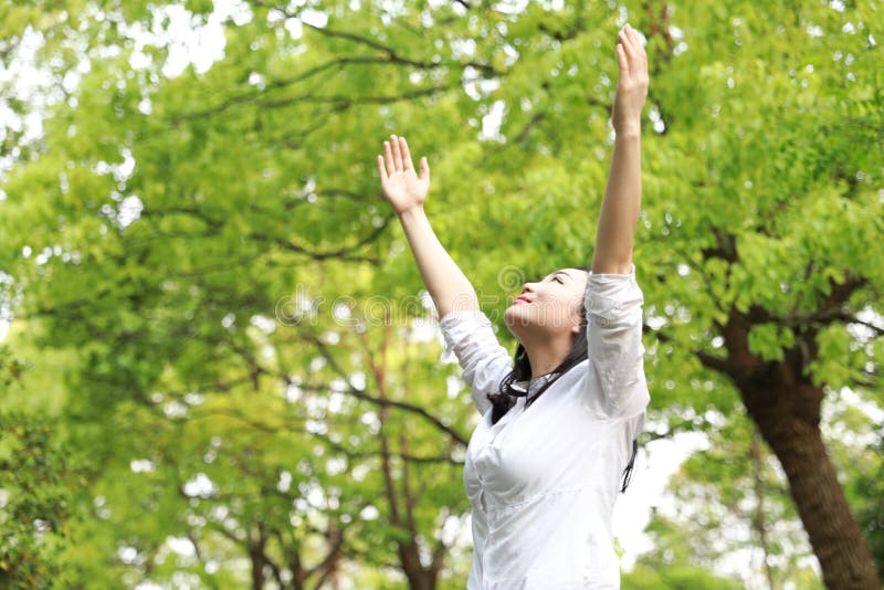 Free careless causual beauty girl woman hug nature enjoy relax time in forest summer park