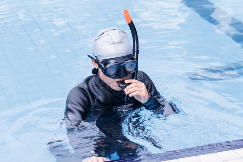 Free Diving Training On Swimming Pool Stock Photo - Image of equipment